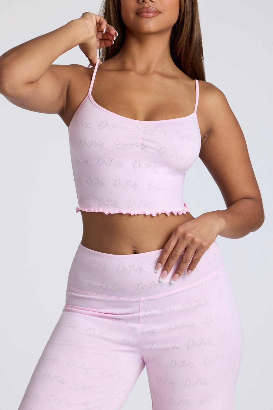 top cropped com alças e detalhe franzido em ponto ajour na cor rosa bebê.