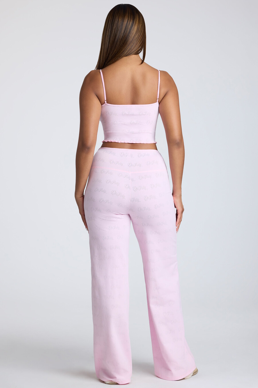 top cropped com alças e detalhe franzido em ponto ajour na cor rosa bebê.
