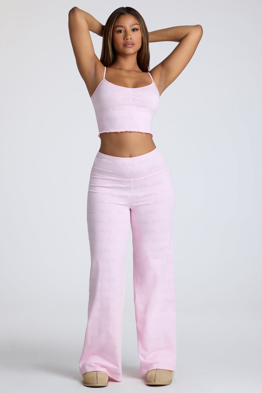 top cropped com alças e detalhe franzido em ponto ajour na cor rosa bebê.