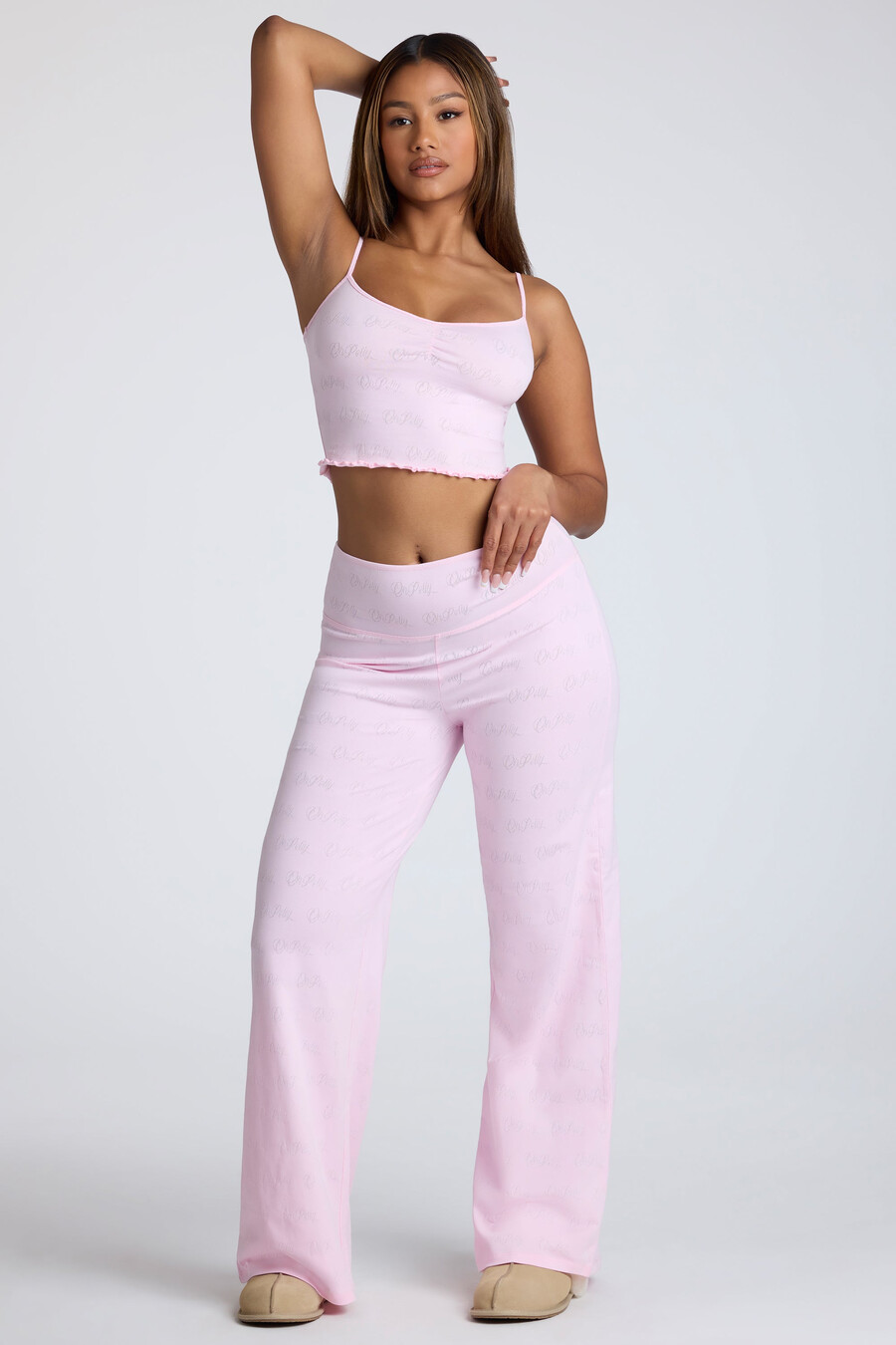 top cropped com alças e detalhe franzido em ponto ajour na cor rosa bebê.