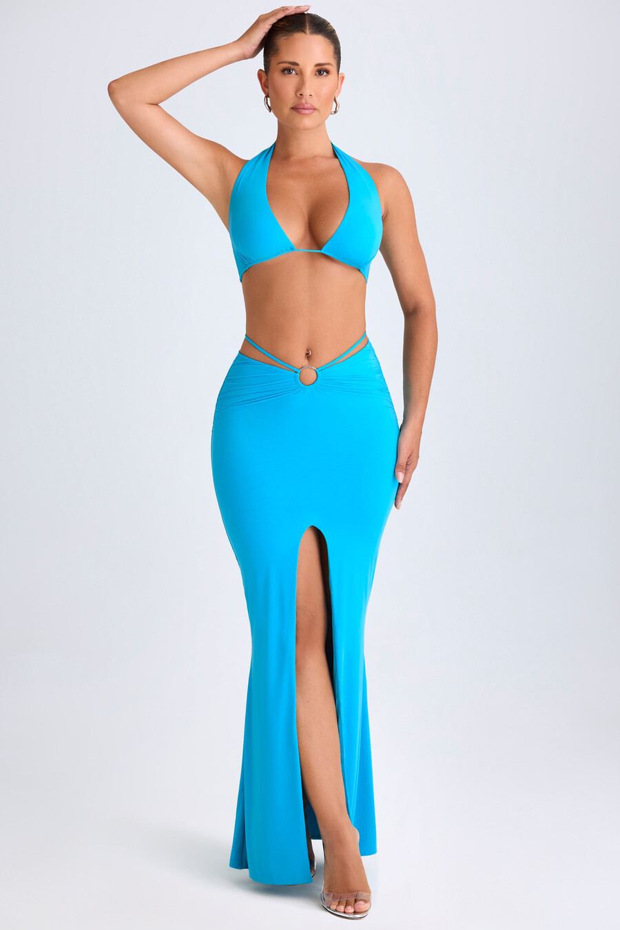 saia longa midi com detalhes em metal na cor azul-turquesa