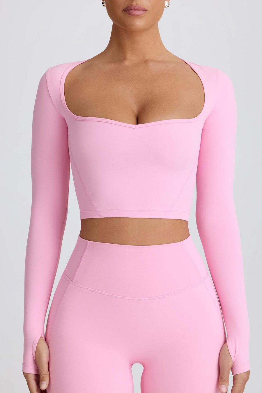 top cropped soft active com decote coração na cor rosa bebê