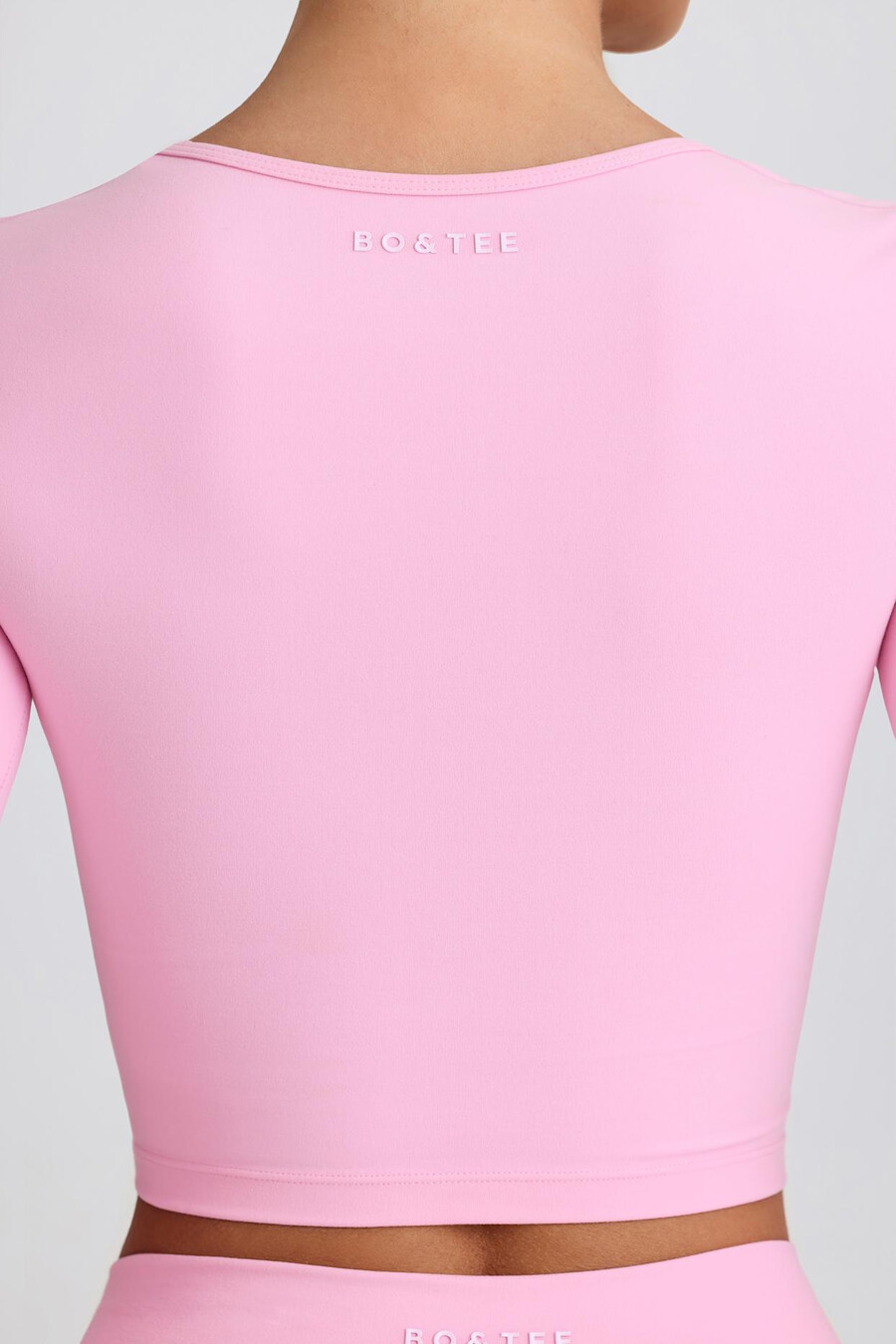 top cropped soft active com decote coração na cor rosa bebê