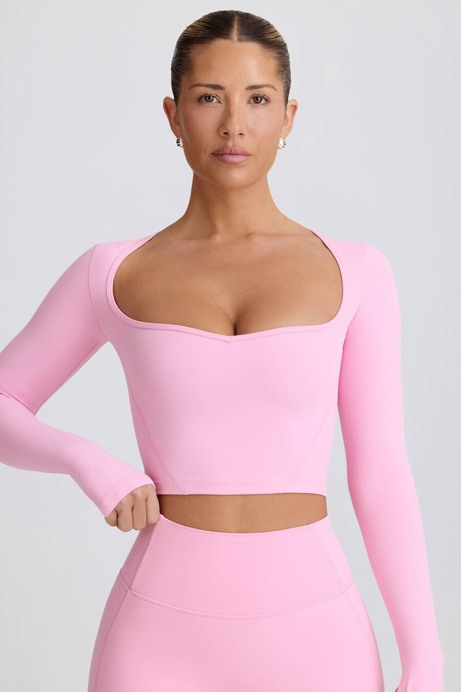 top cropped soft active com decote coração na cor rosa bebê