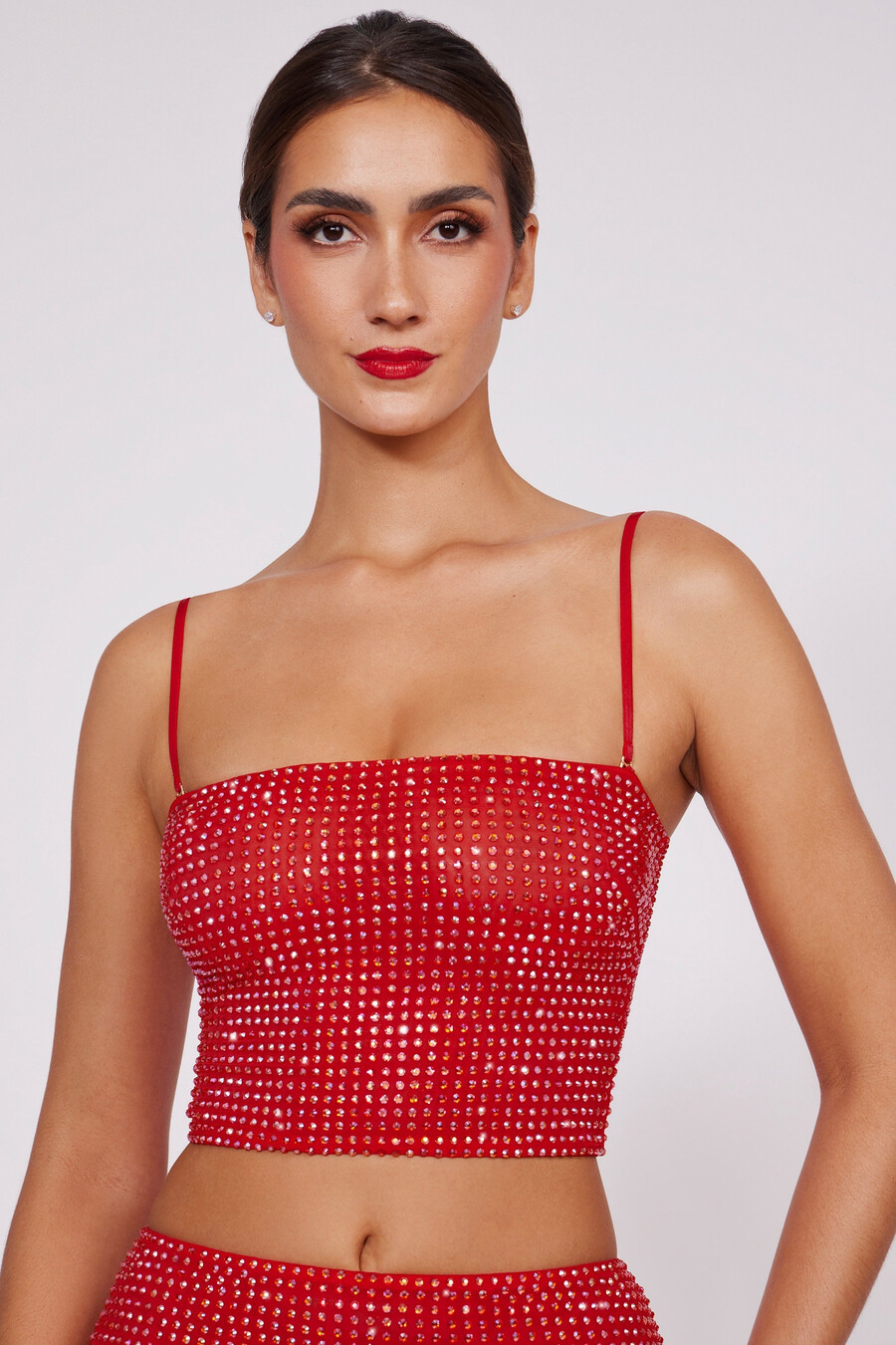 top cropped sem alças com detalhes brilhantes na cor vermelho fogo.