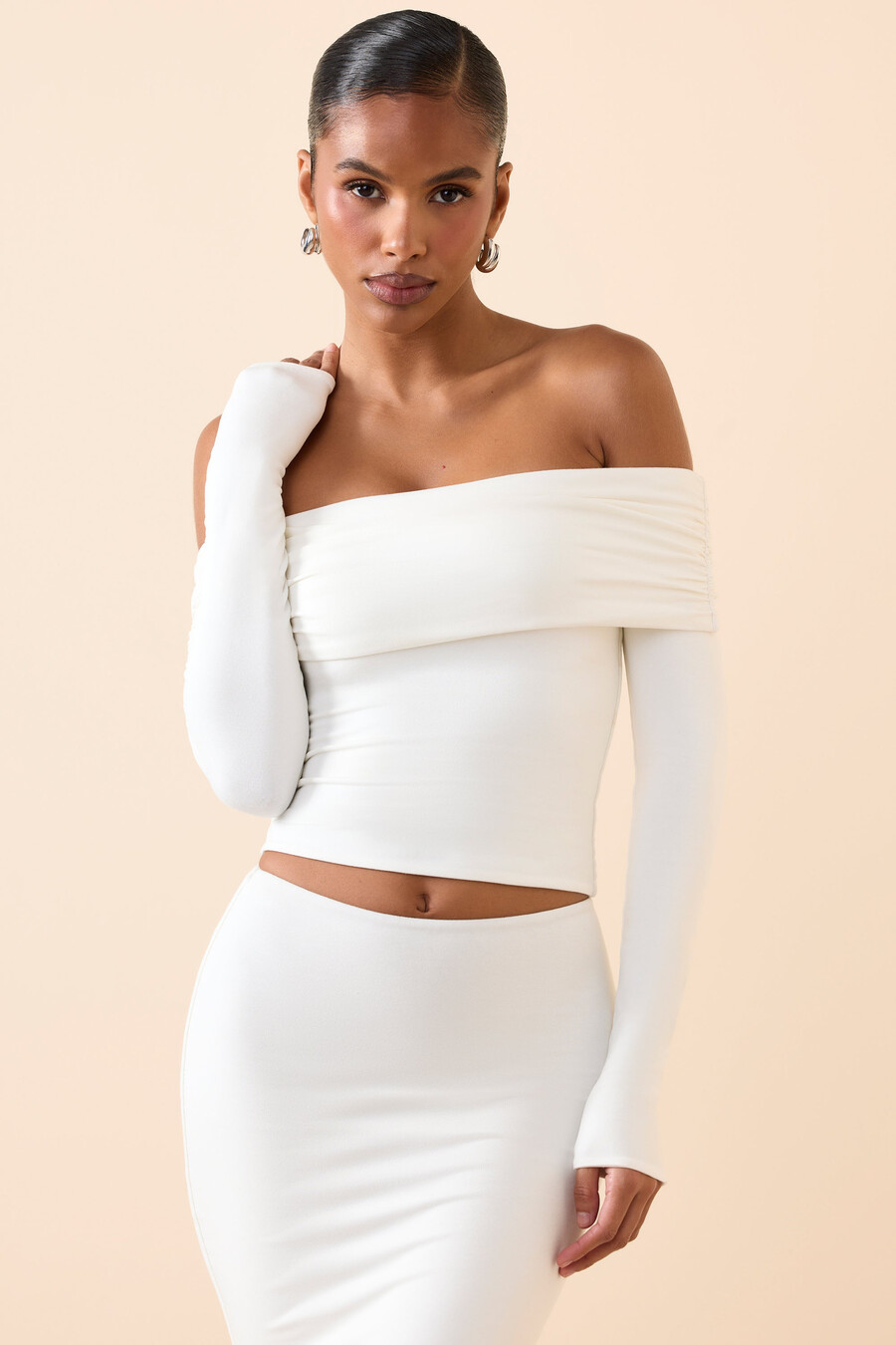 blusa de manga comprida ombro a ombro em modal na cor branca.